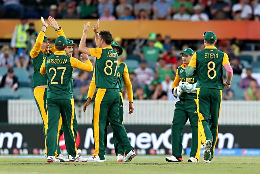Kyle Abbott of South Africa celebrates the wicket of Gary Wilson