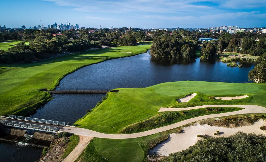 Golf course with a large body of water in Sydney