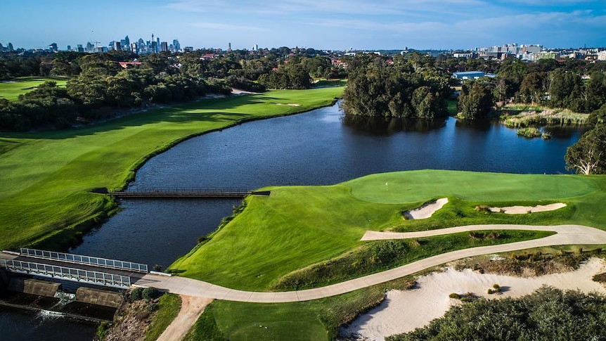 Golf course with a large body of water in Sydney