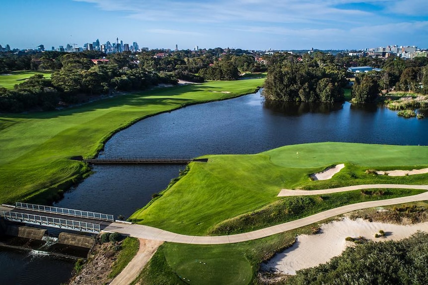 Golf course with a large body of water in Sydney
