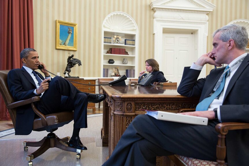 President Barack Obama talks on phone about explosions.