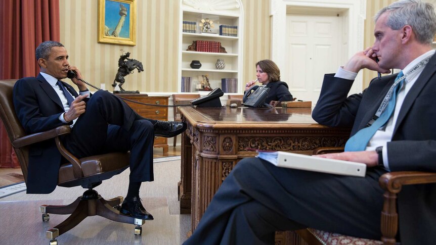 President Barack Obama talks on phone about explosions.