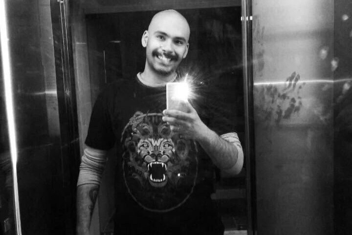 Mohsen Shekari takes a selfie facing a mirror