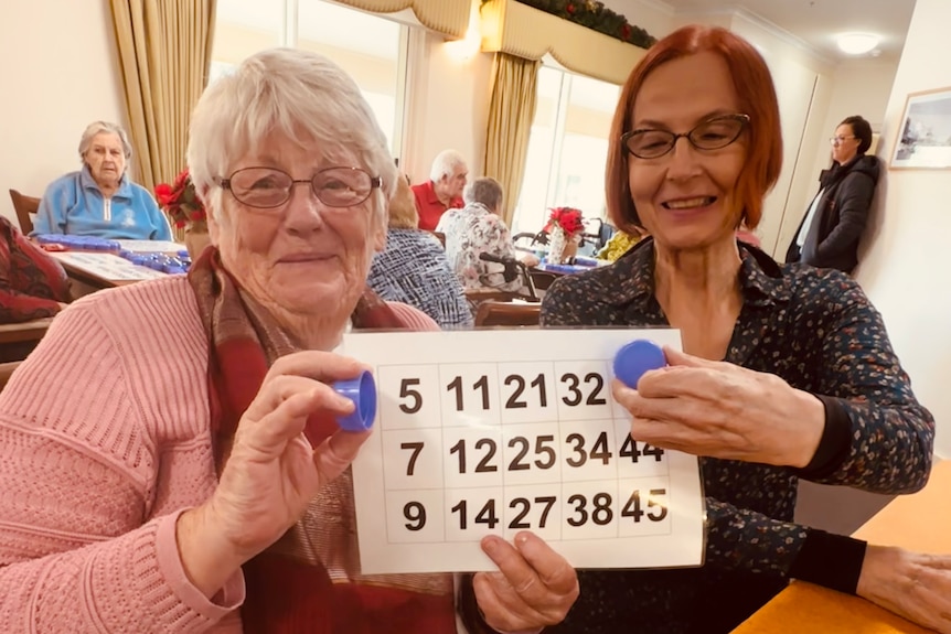 two women playing bingo 