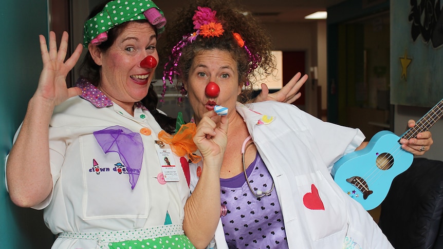 Dr Giggle, clown-tern and Dr Curly doing the rounds at the Alice Springs Hospital.