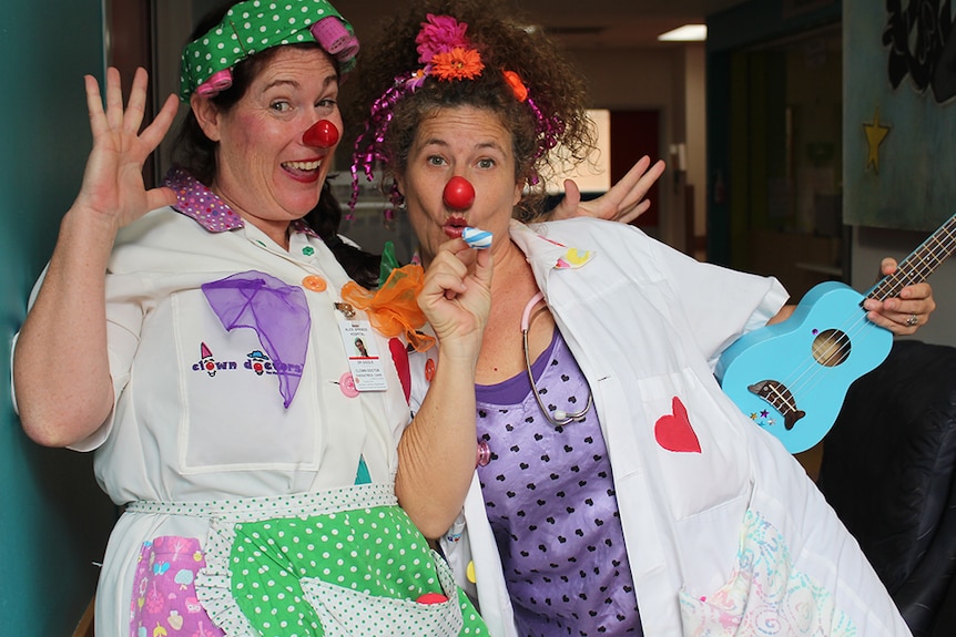 Dr Giggle, clown-tern and Dr Curly doing the rounds at the Alice Springs Hospital.