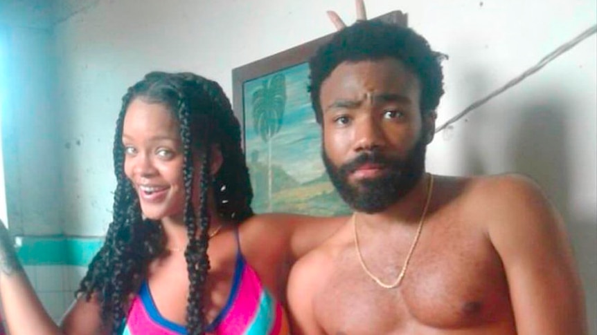 Rihanna and Donald Glover on the set of Guava Island