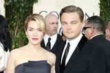 Winner: Kate Winslet and her Revolutionary Road co-star Leonardo Dicaprio at the Globes.