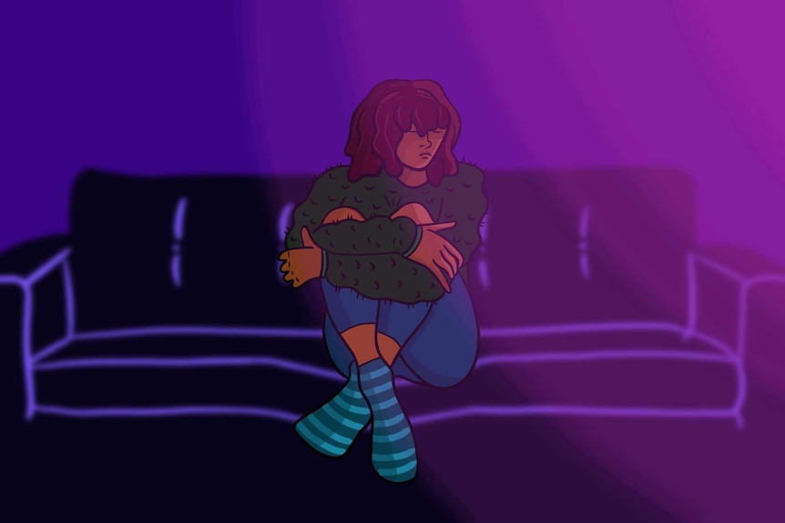 An illustration of a woman sitting, hugging her knees on a couch, in a story about seasonal affective disorder (SAD).