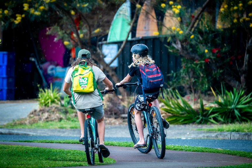 Two kids riding on bikes in Hawks Nest