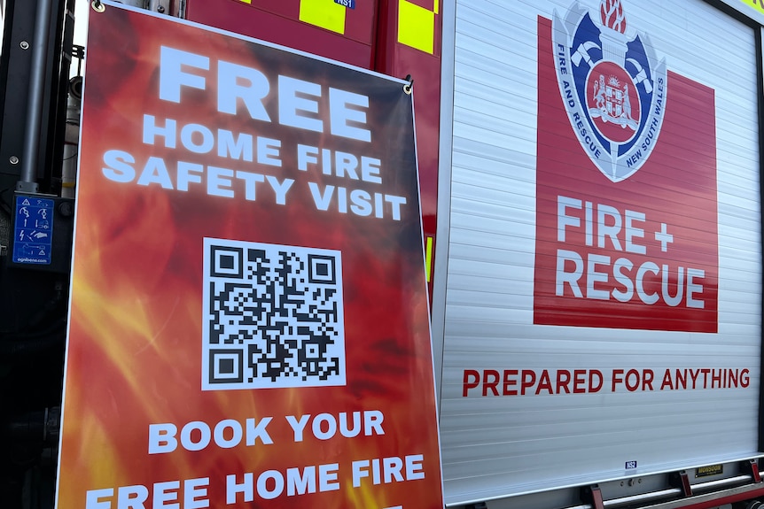 picture of a banner with a qr code and a FRNSW truck logo