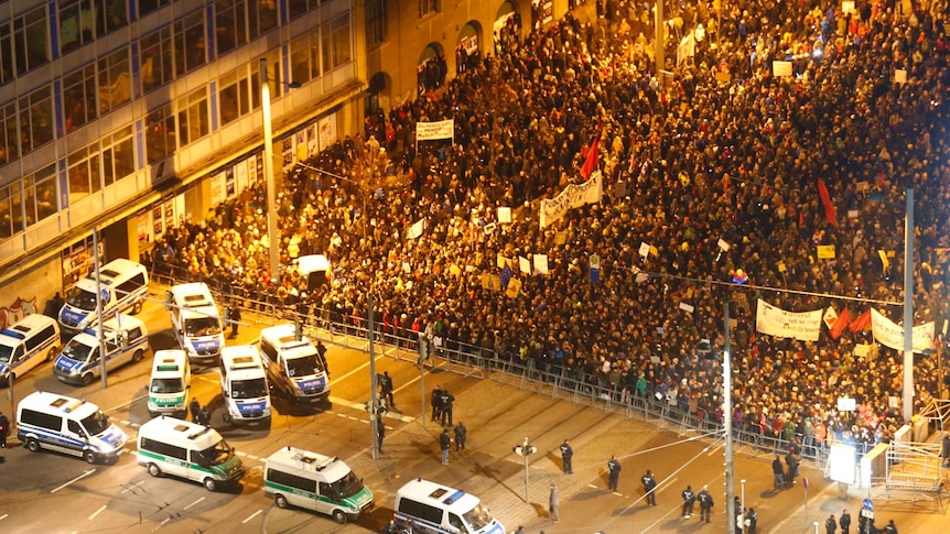 Thousands of Germans attend an anti-immigration rally organised by LEGIDA aka PEGIDA in Leipzig on 21 January 2015