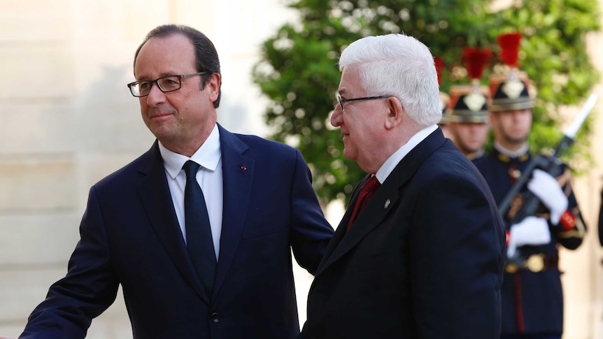 Francois Hollande and Fuad Masum