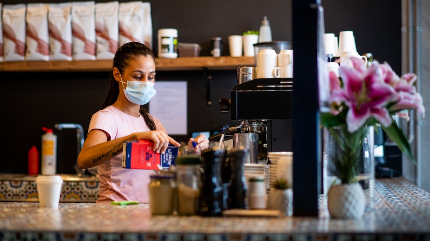 Melissa Djafar, manager at Darwin cafe Ruby G's Canteen and Bakery, making coffee. 