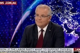 Scott Morrison sits at a desk, wearing a suit. The image has Sky News branding.
