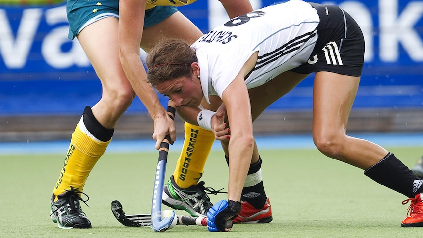 Solitary win ... Australia's Jodie Schulz (L) challenges Germany's Christina Schutze.