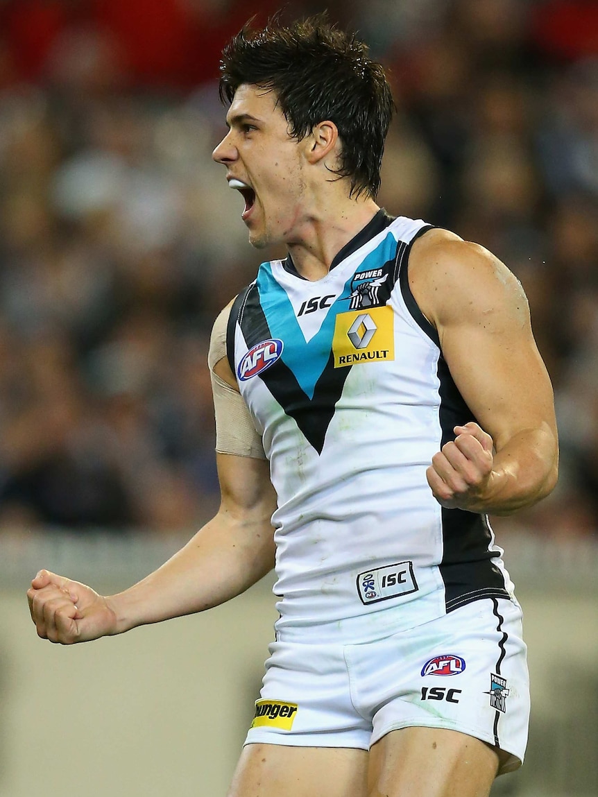 Monfries celebrates as Port overpowers Collingwood