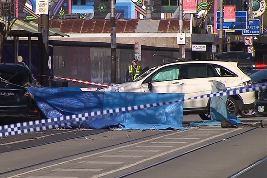 A white Mercedes is roped off by police tape after a fatal hit-and-run on Chapel Street.