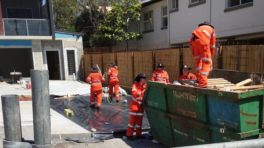 SES crews search a construction site for clues into the death of Danielle Miller.