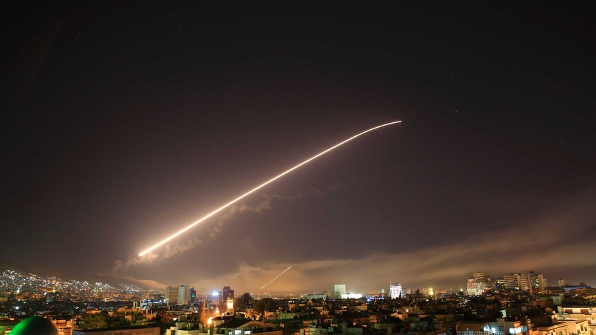 Missile shoots across the sky in Syria