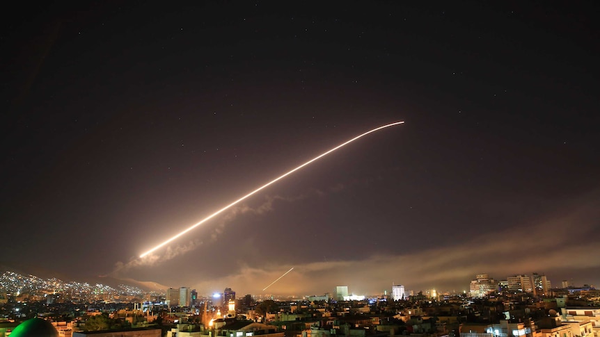 Missile shoots across the sky in Syria