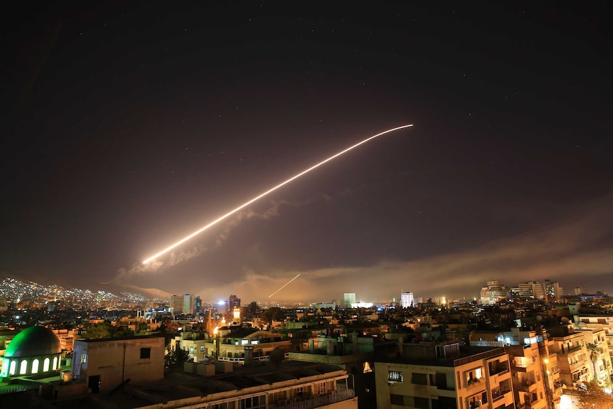 Missile shoots across the sky in Syria