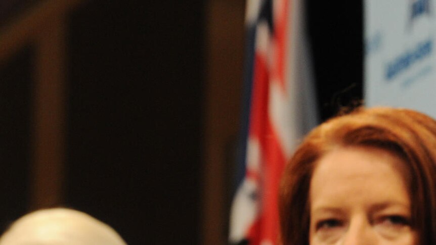 Julia Gillard sits with Gail Kelly and Catherine Livingstone