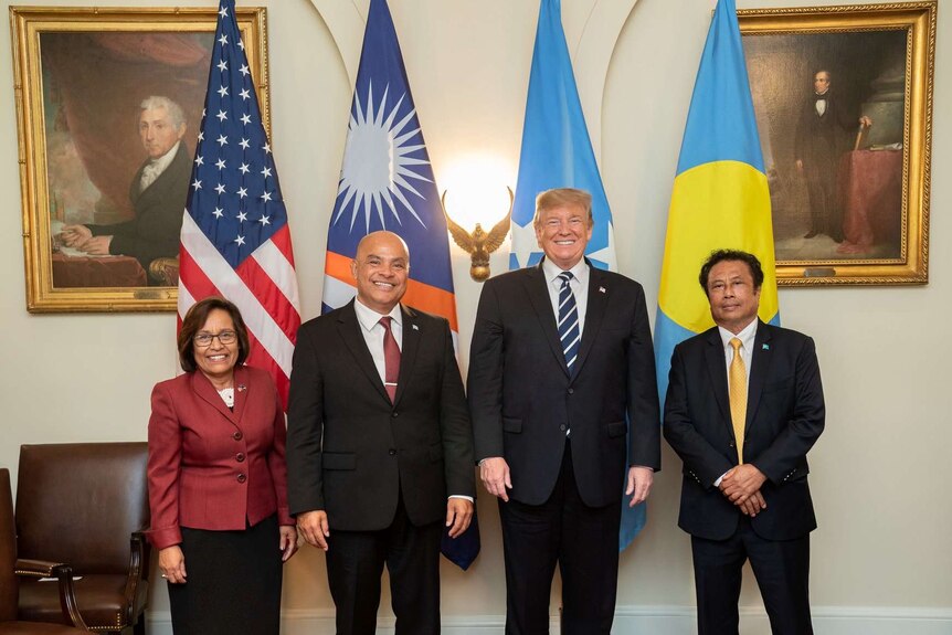 Donald Trump poses with the presidents of Palau, the Marshall Islands and the Federated States of Micronesia.