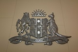 NSW shield hangs above the court.