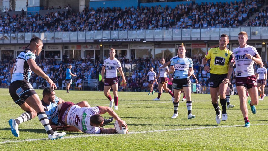 Manly's Dylan Walker scores a try against Cronulla