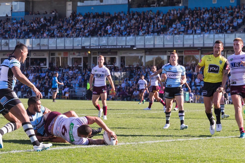 Dylan Walker scores a try for Manly against Cronulla at Shark Park.