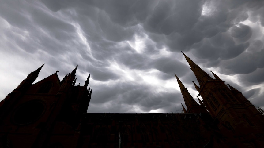 Storm clouds form over the the Catholic Church's St. Mary's Cathedral in the CBD, Sydney.