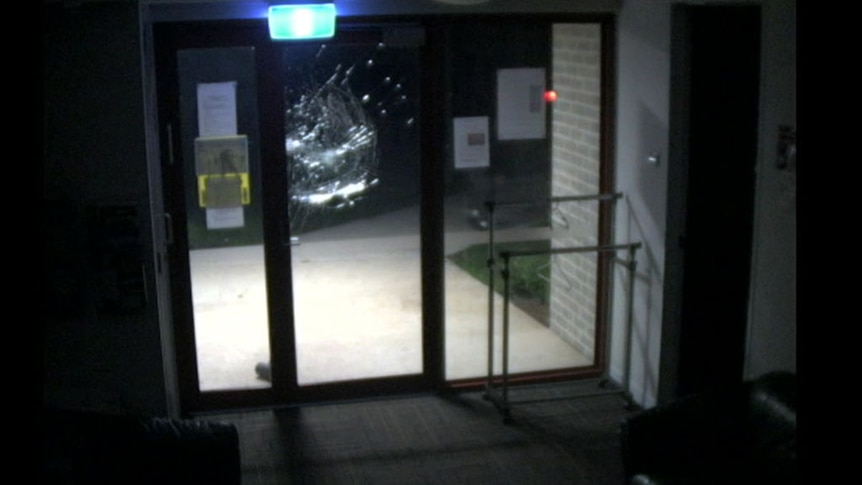 CCTV still of damage to Jewish homes and places of worship in Canberra.