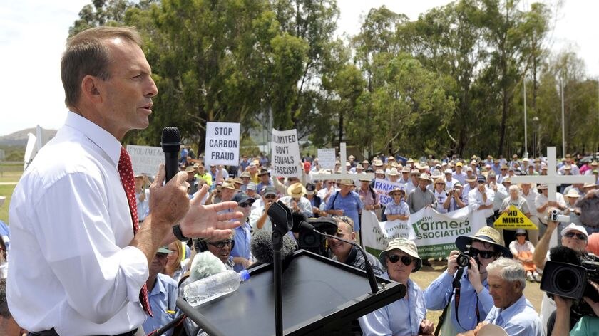 Opposition Leader Tony Abbott speaks to a rally of farmers outside Parliament House in Canberra