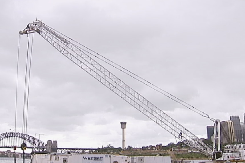 The crane on a construction barge in Balmain