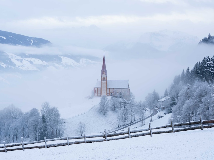 A church on a snowy mountain.