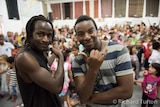 West African rappers perform to school children in East Timor to mark anniversary of Balibo five deaths