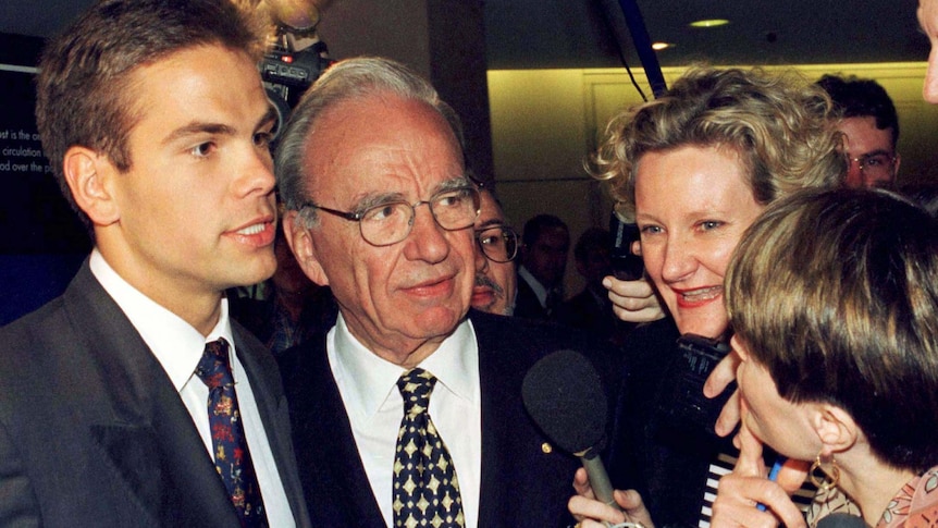 Lachlan and Rupert Murdoch speak at a press conference 