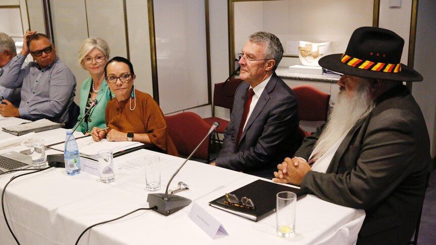 Helen Haines, Linda Burney, Mark Dreyfus and Pat Dodson sit at a table alongside each other
