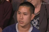 A headshot of a man in the Q&A audience.