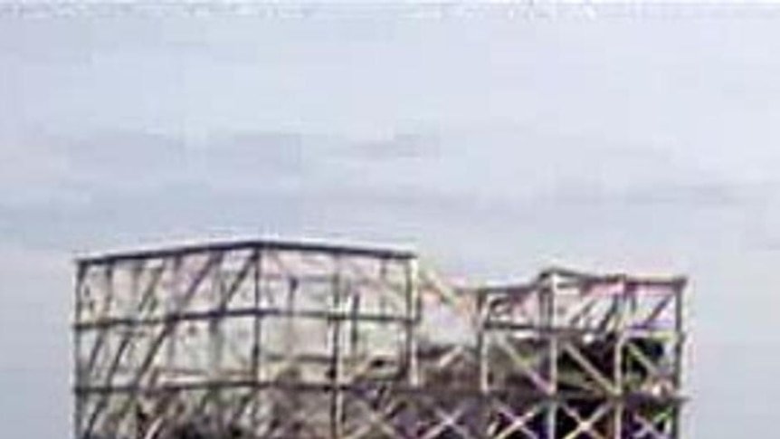 Damaged reactor buildings 1 and 2 at the Fukushima nuclear power station.