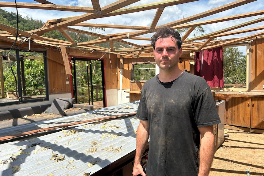Sam Bray with his home at Wongawallen that was destroyed on Christmas Day.