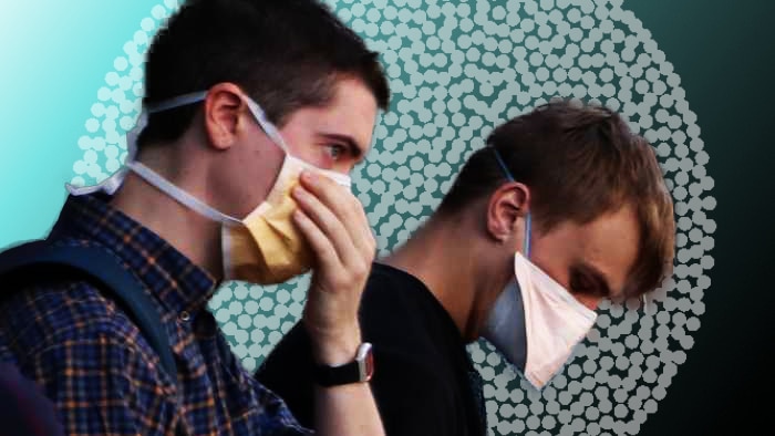 Two people wearing face masks with a cluster of dots representing exponential growth in the background.