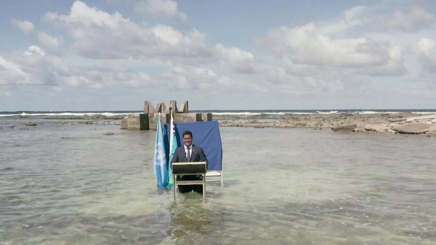 Tuvalu Foreign Minister delivers COP26 speech knee-deep in ocean