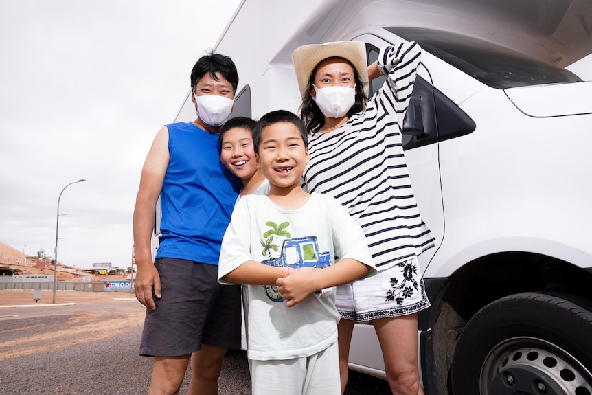 An outback tourist with her family.