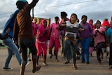 Young people dance near Nelson Mandela's house in Qunu