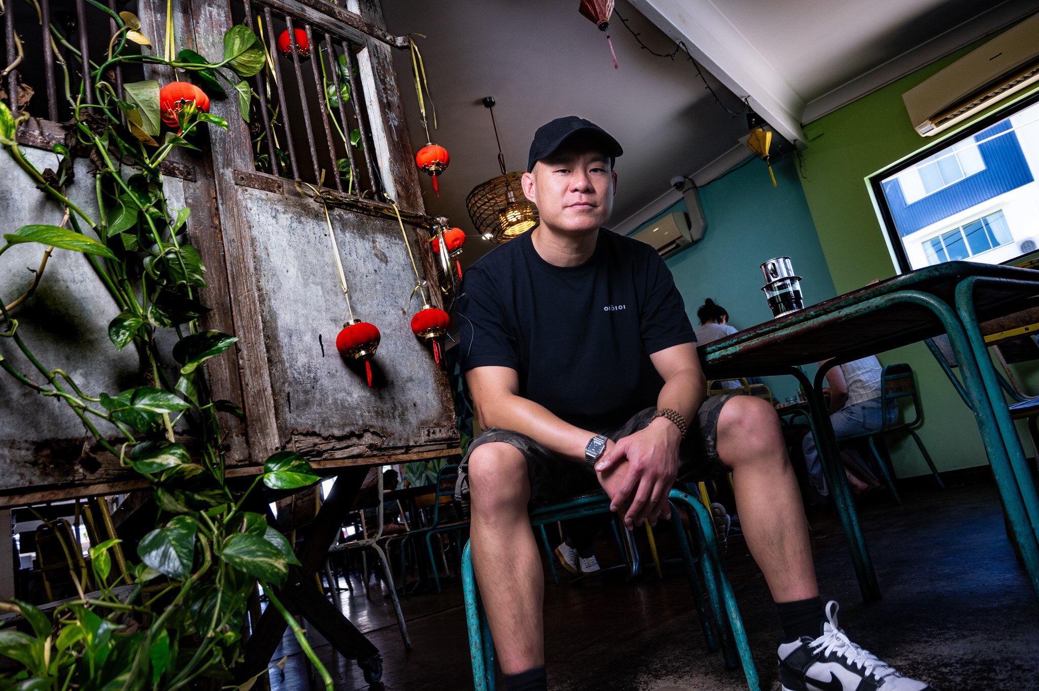 An asian man in an asian cafe