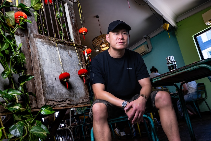 An asian man in an asian cafe