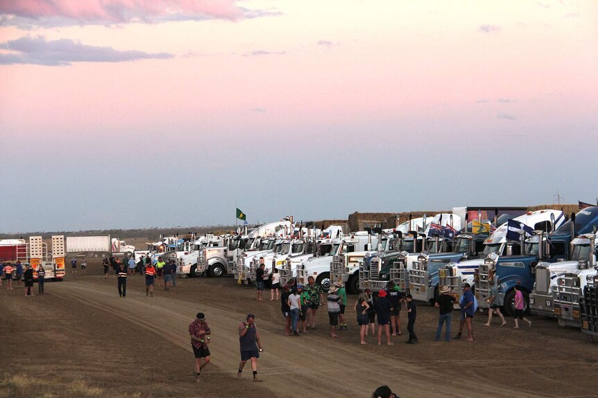 Trucks parked at Ilfracombe in central-west Queensland as part of the 11th Burrumbuttock Hay Runners event.
