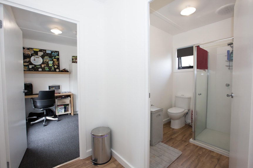 The bathroom and bedroom inside a Kids Under Cover homelessness prevention studio